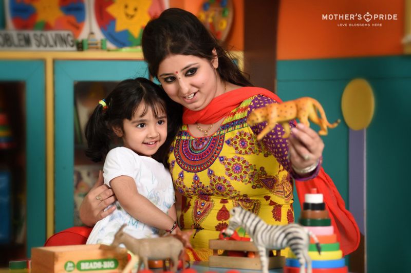 Children-enjoying-storytelling-time-with-their-teacher-in-a-vibrant-preschool-in-Gurgaon