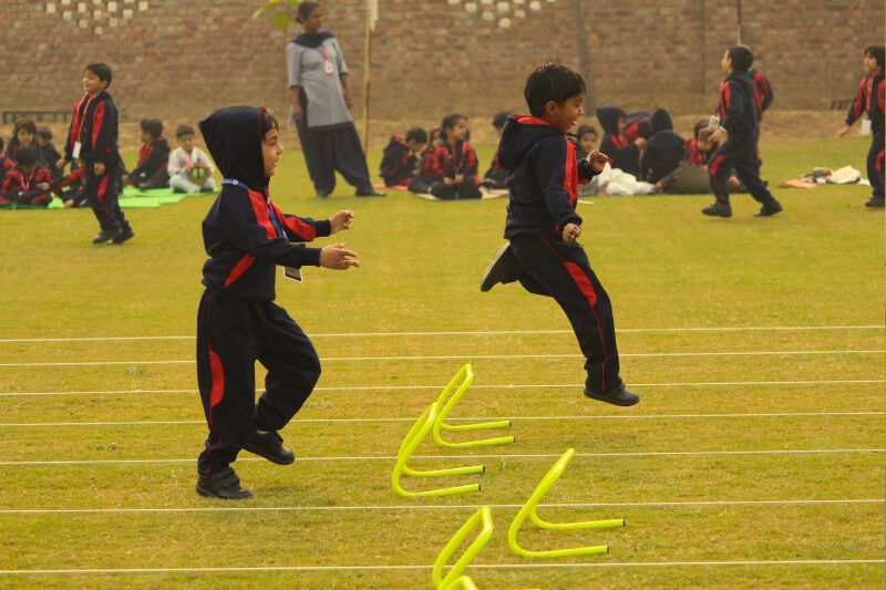 Kids playing with blocks and learning teamwork skills in a preschool in Haily Mandi