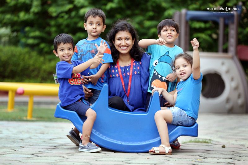 Teacher guiding children through a sensory play activity in Pataudi’s preschool